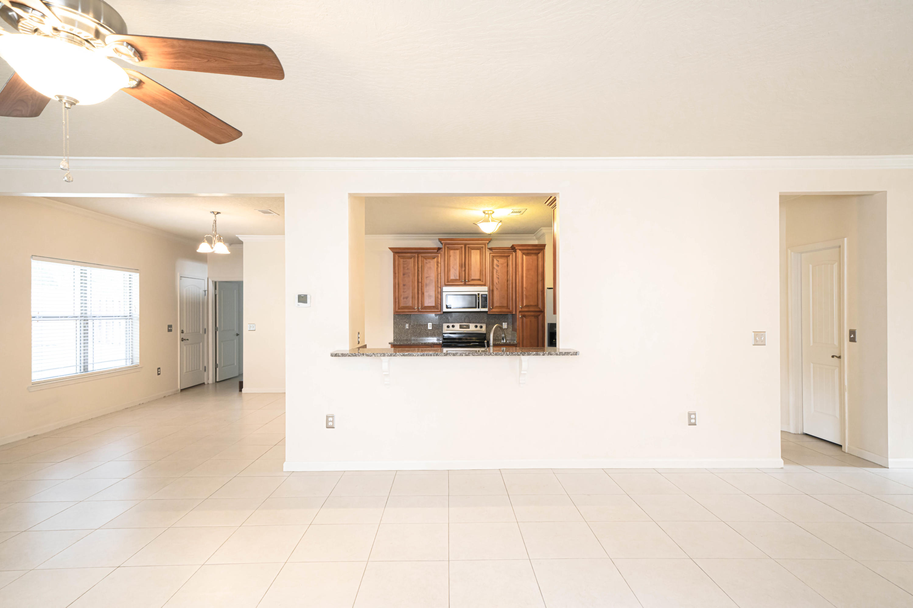 4582 Hermosa Road Crestview, FL 32539 - Photo 8 of 26 a view of a house with a porch