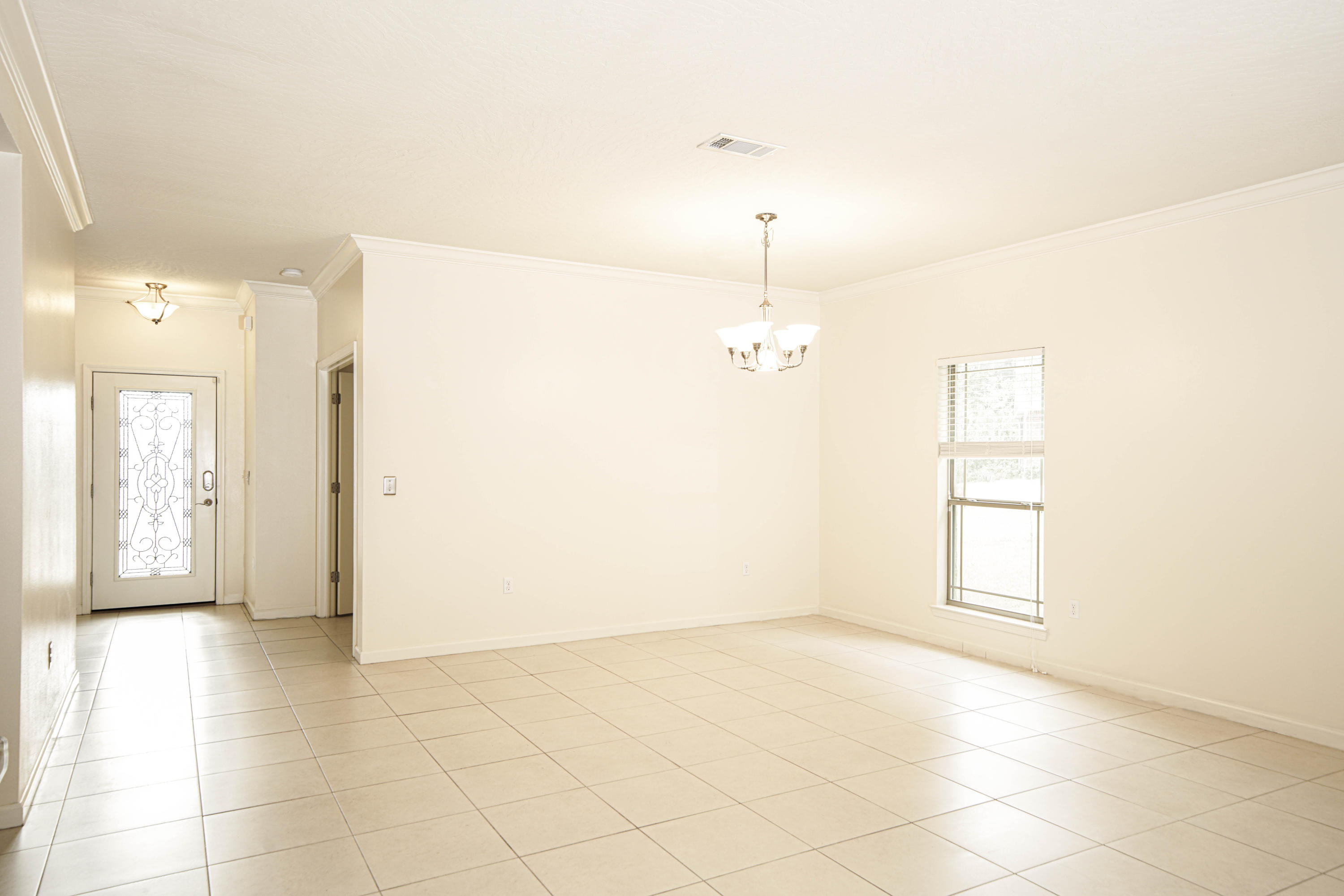 4582 Hermosa Road Crestview, FL 32539 - Photo 10 of 26 a view of a room with a natural light