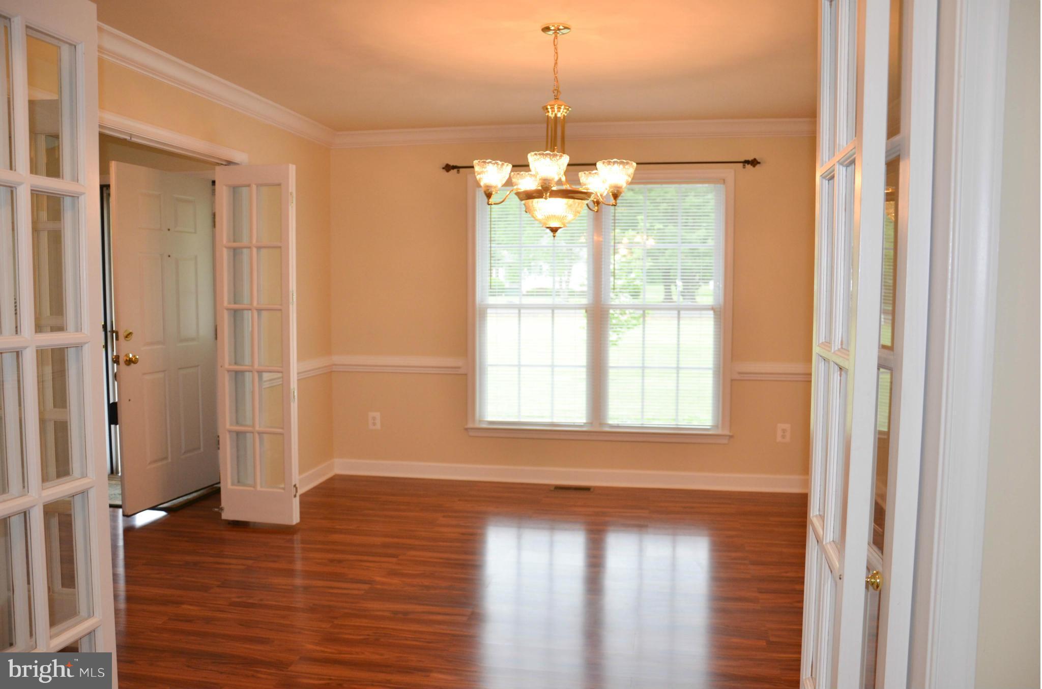 21021 Batna Road Culpeper, VA 22701 - Photo 4 of 30 Formal dining room w/ crown molding and chair rail