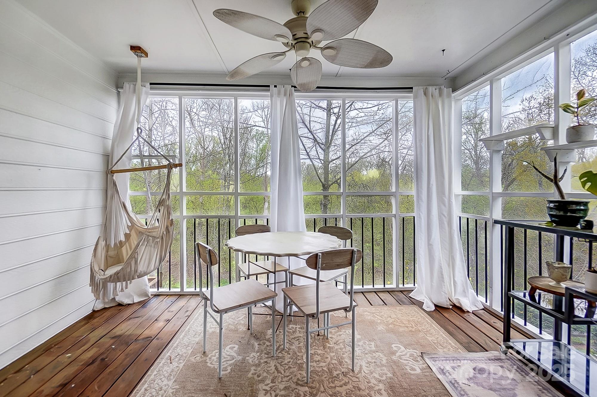 329 Treeline Drive Belmont, NC 28012 - Photo 13 of 48 a view of a patio with a table and chairs