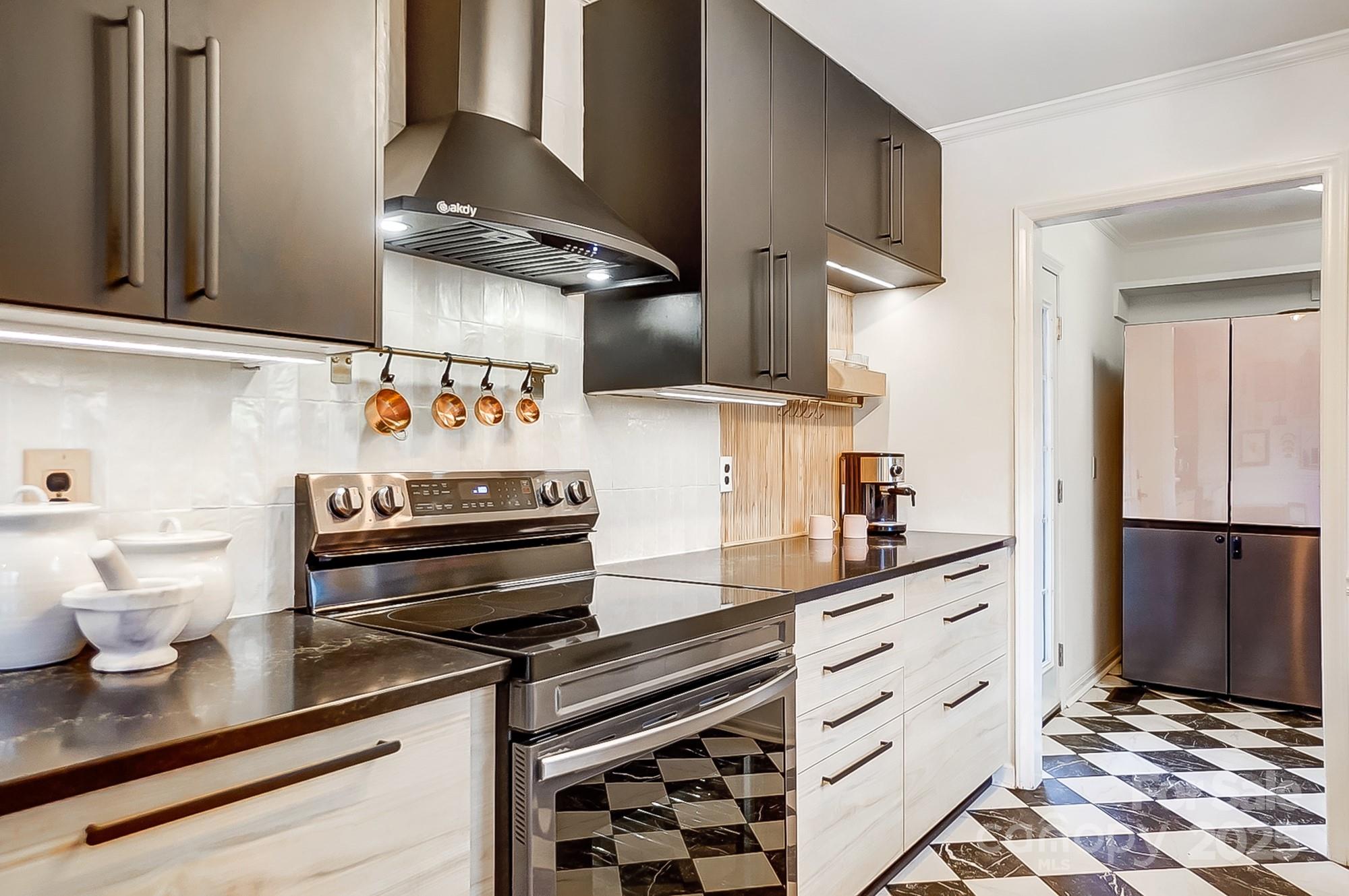 329 Treeline Drive Belmont, NC 28012 - Photo 19 of 48 a kitchen with stainless steel appliances a sink and cabinets