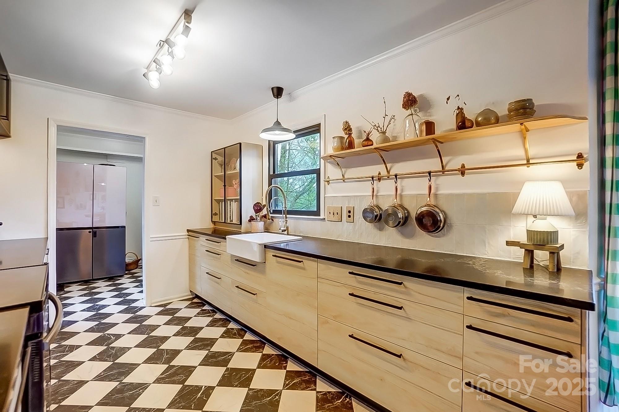 329 Treeline Drive Belmont, NC 28012 - Photo 20 of 48 a kitchen with a sink and cabinets