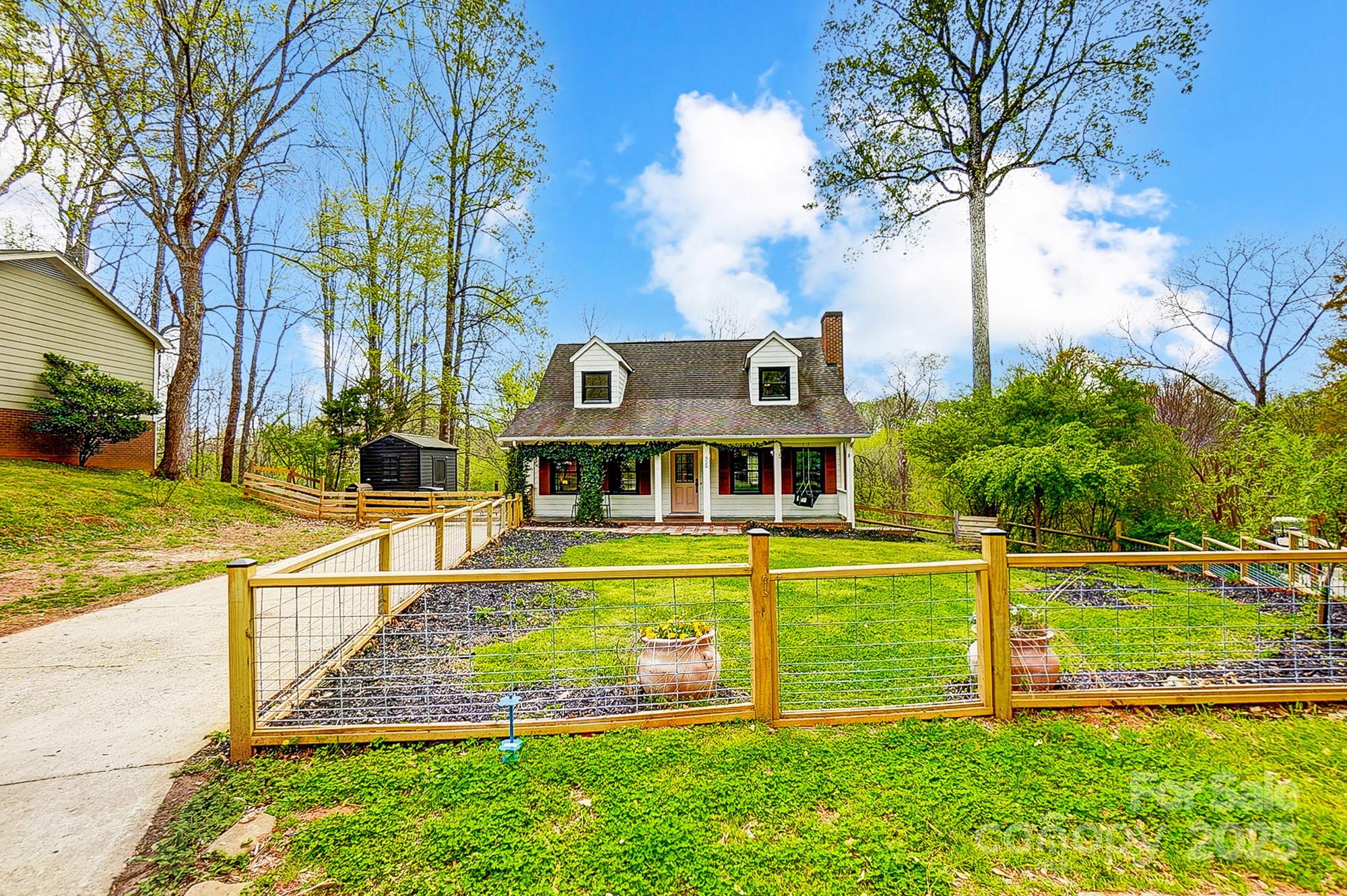 329 Treeline Drive Belmont, NC 28012 - Photo 2 of 48 a view of a house with pool and a big yard