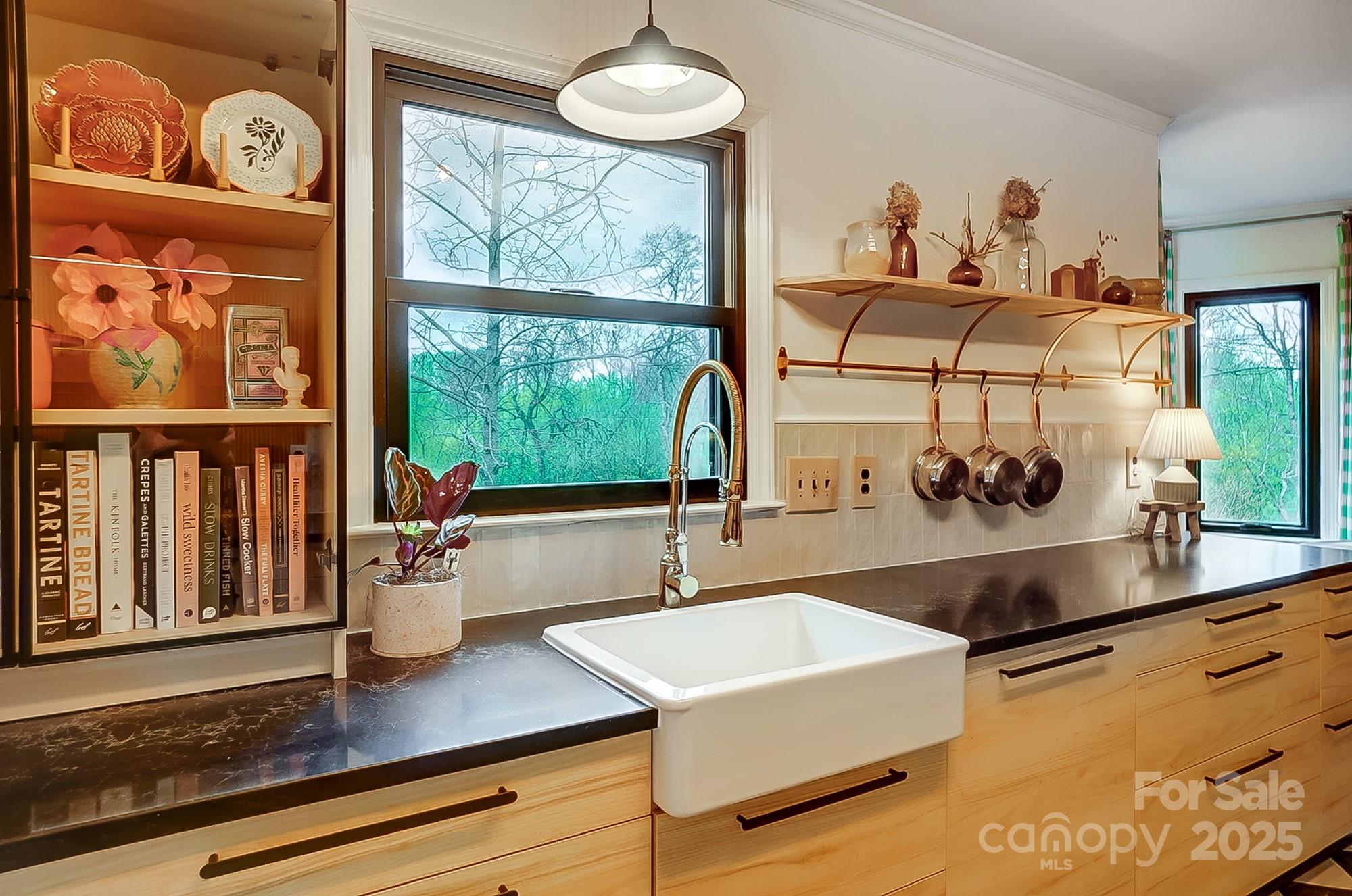 329 Treeline Drive Belmont, NC 28012 - Photo 23 of 48 a living room with wooden floor and large window with garden view