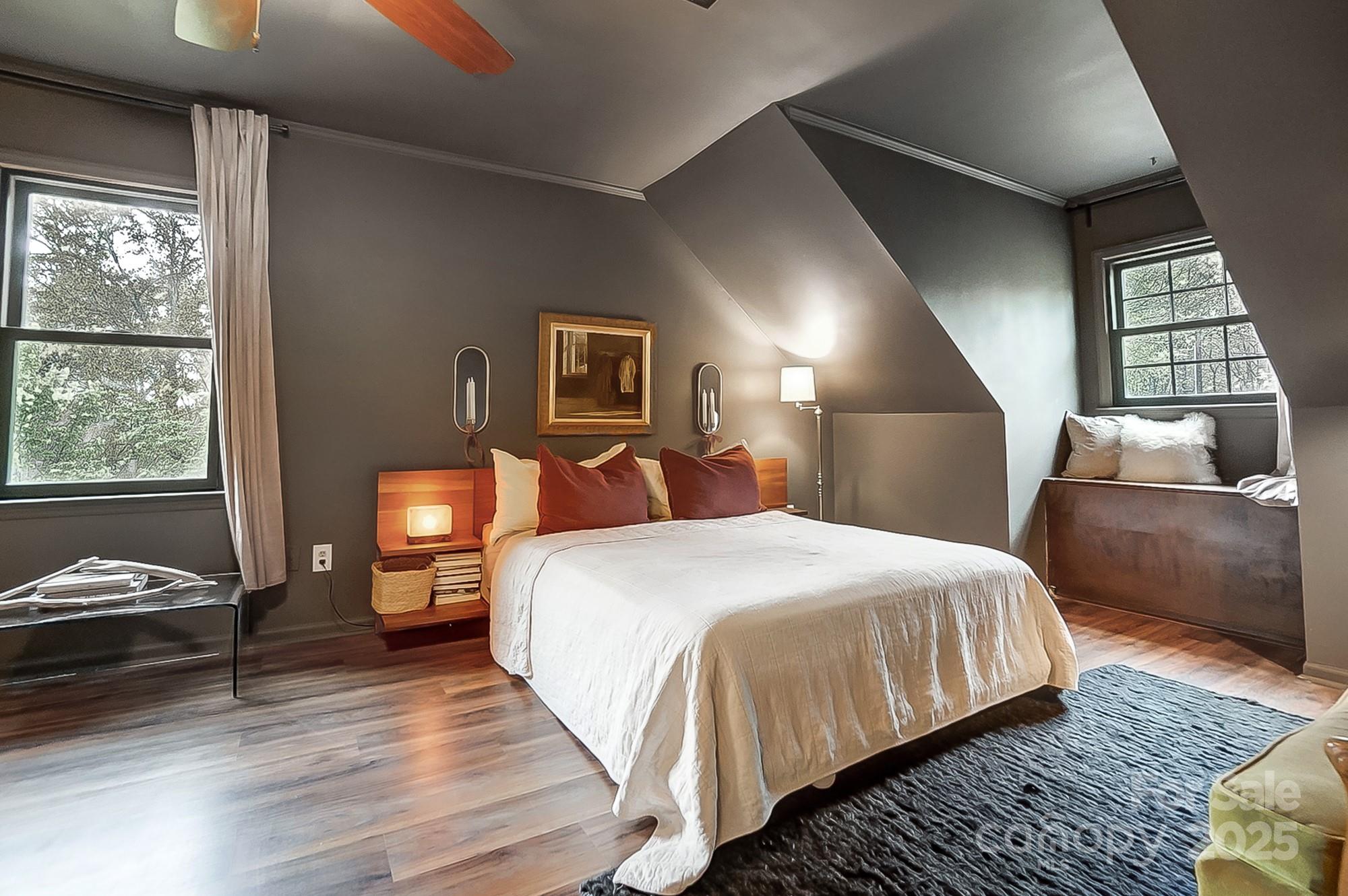 329 Treeline Drive Belmont, NC 28012 - Photo 31 of 48 a bedroom with a bed and wooden floor