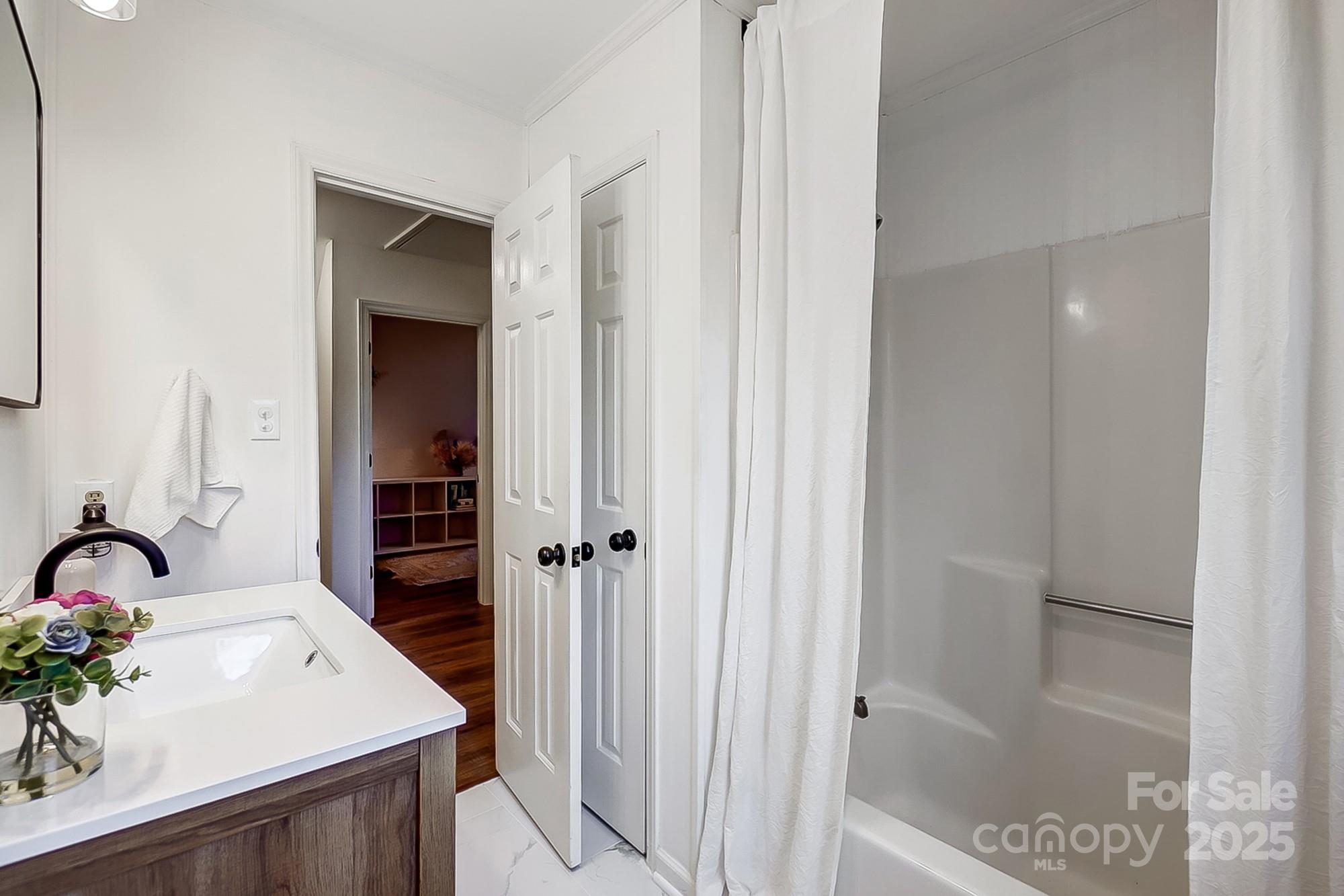 329 Treeline Drive Belmont, NC 28012 - Photo 35 of 48 a view of a bathroom from a hallway