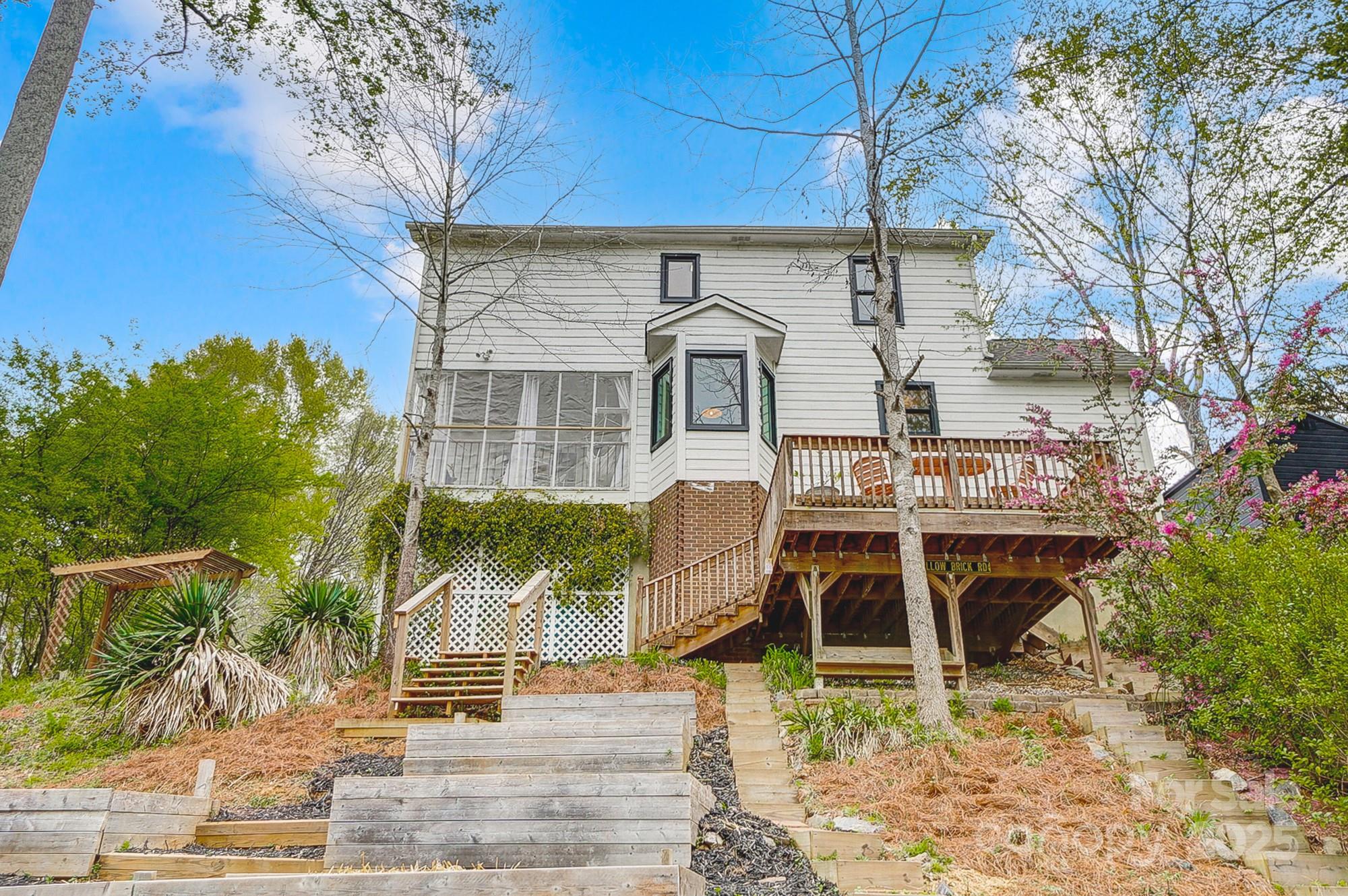 329 Treeline Drive Belmont, NC 28012 - Photo 47 of 48 a front view of a house with a garden