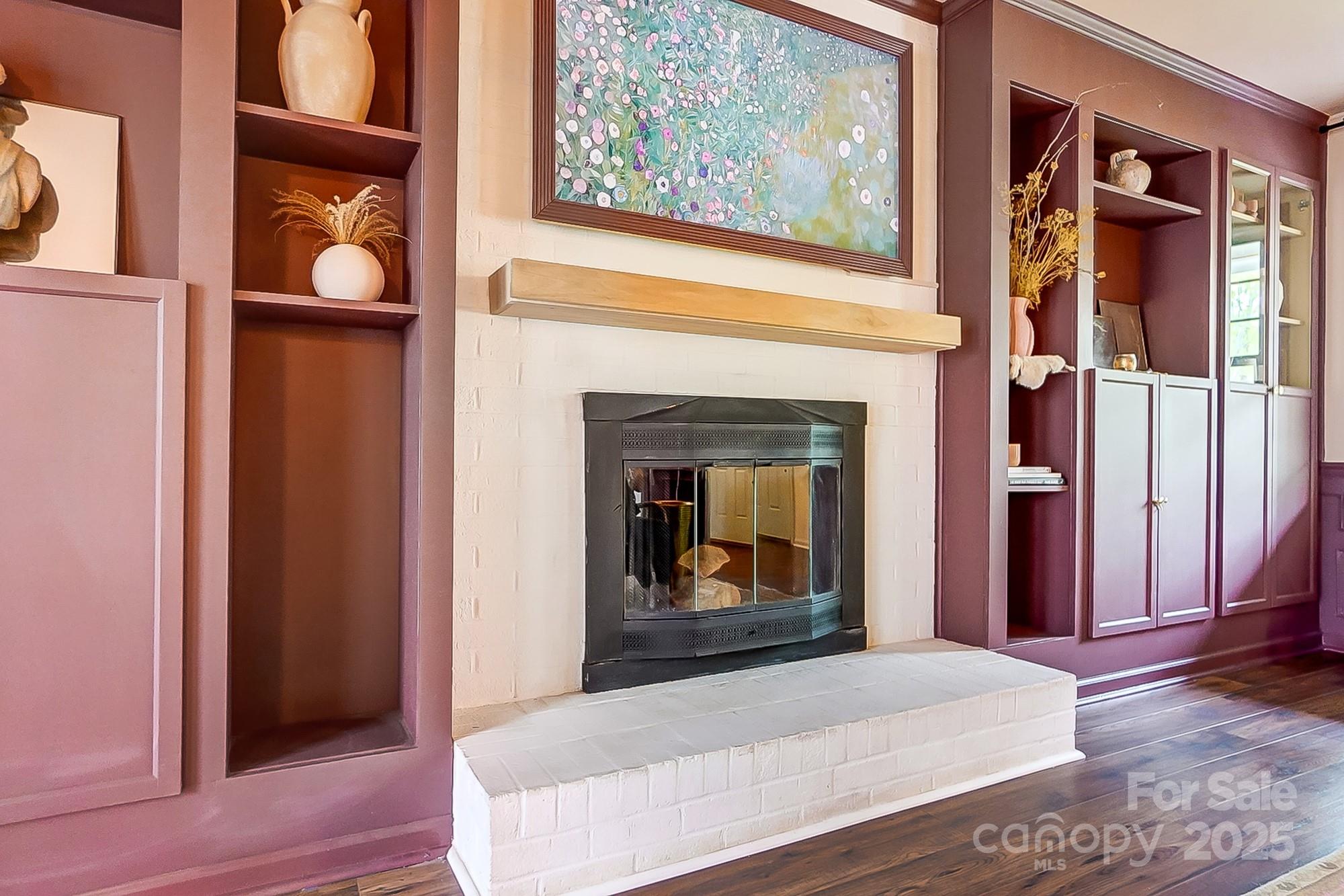 329 Treeline Drive Belmont, NC 28012 - Photo 10 of 48 a bedroom with a bed and a fireplace with wooden floor