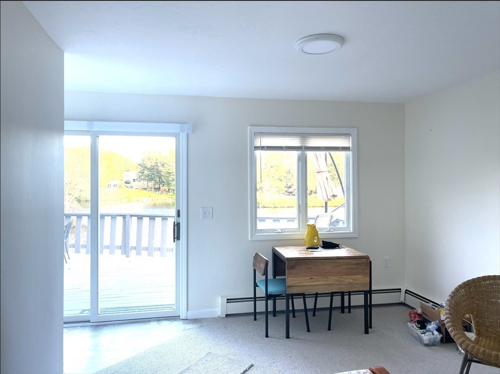 81 Jolicoeur Avenue, Unit B Spencer, MA 01562 - Photo 2 of 8 a workspace with furniture and a window