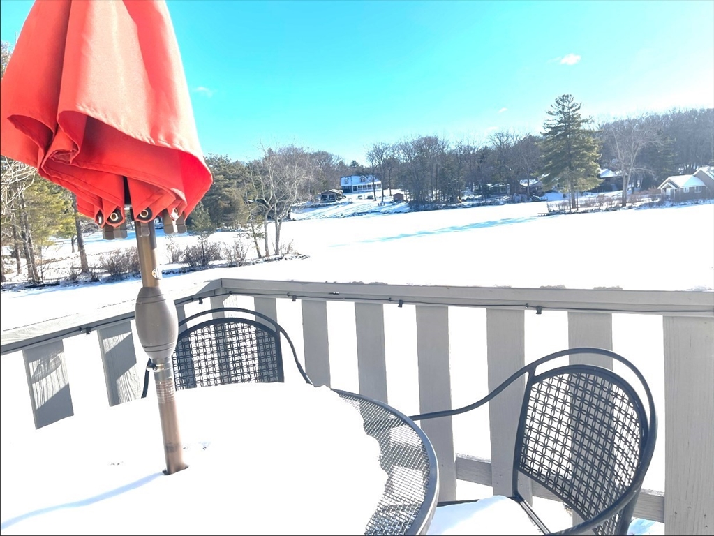 81 Jolicoeur Avenue, Unit B Spencer, MA 01562 - Photo 6 of 8 a view of balcony with furniture