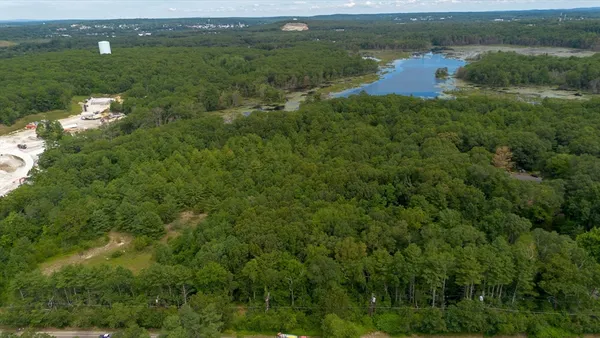 a view of a lake with a city