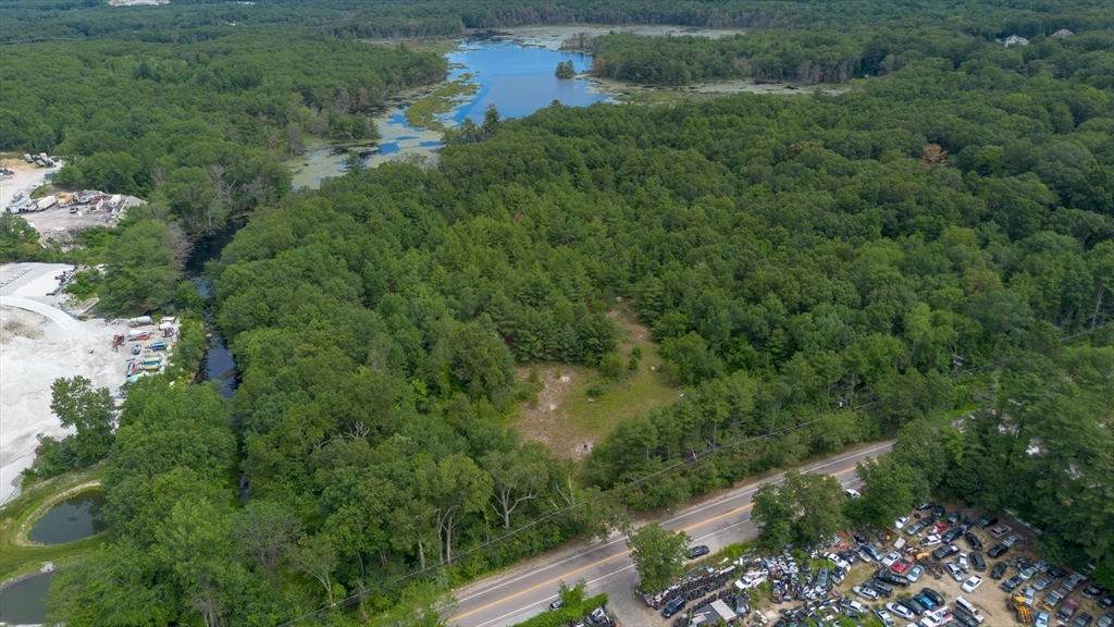 0 Hartford Avenue Bellingham, MA 02019 - Photo 6 of 15 an aerial view of residential houses with outdoor space and trees