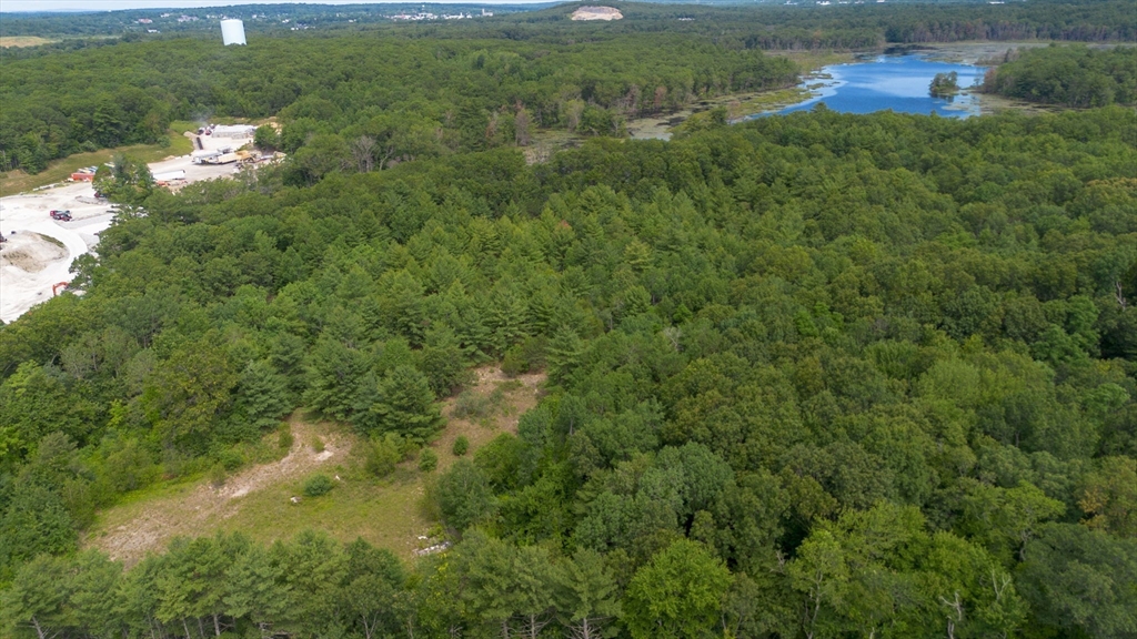 0 Hartford Avenue Bellingham, MA 02019 - Photo 8 of 15 a view of a lake view with a garden