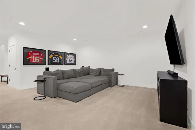 a view of a patio with couches chairs and potted plants