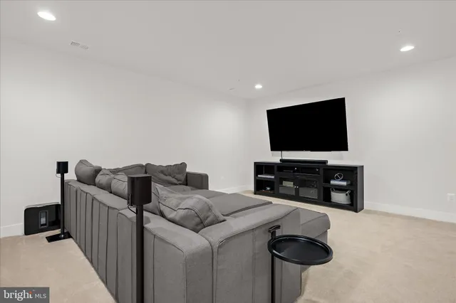 a view of a chair and table in the backyard