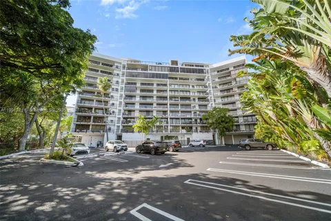 a building exterior with stairs and windows