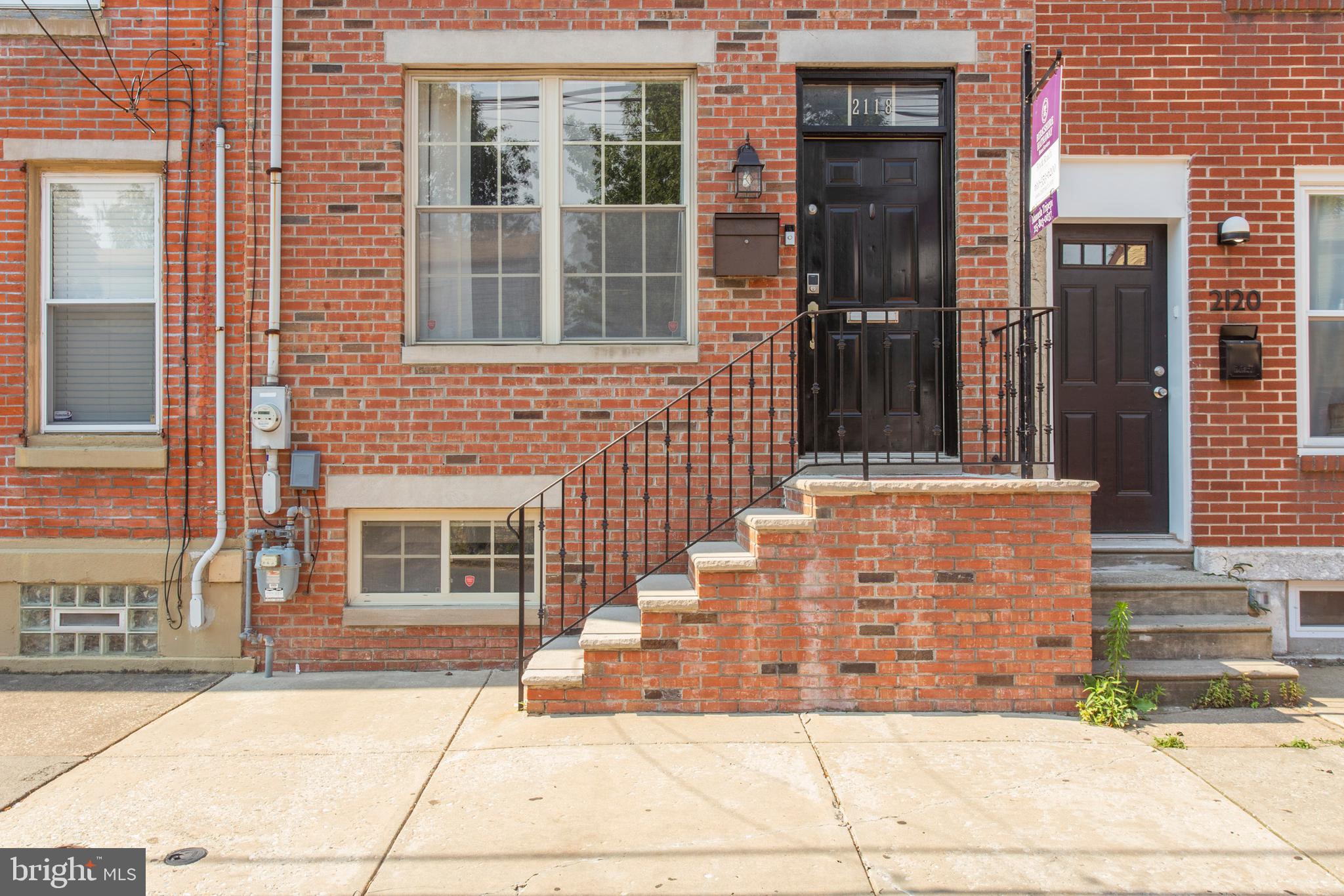 2118 Ellsworth Street Philadelphia, PA 19146 - Photo 1 of 32 a front view of a house