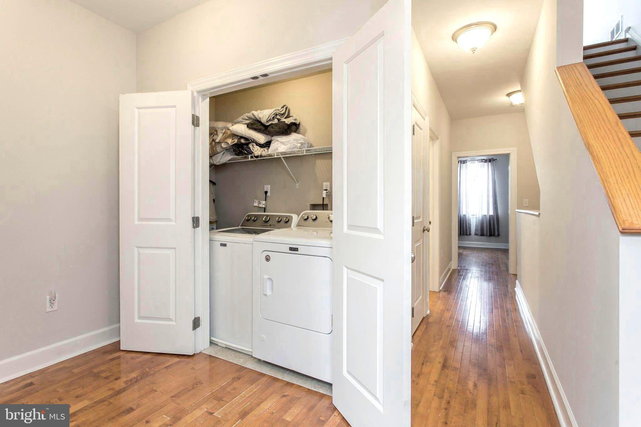 2118 Ellsworth Street Philadelphia, PA 19146 - Photo 15 of 32 a view of hallway with wooden floor