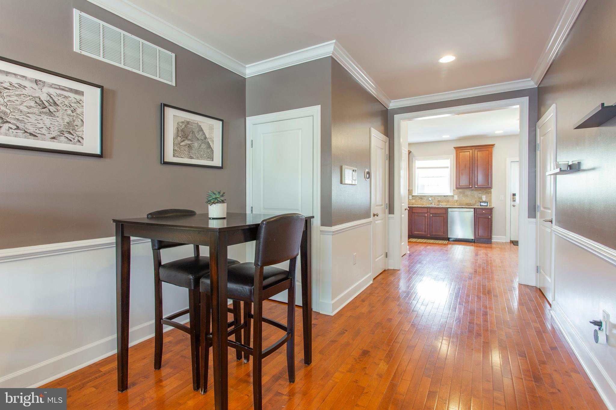 2118 Ellsworth Street Philadelphia, PA 19146 - Photo 7 of 32 a view of a dining room with furniture and wooden floor