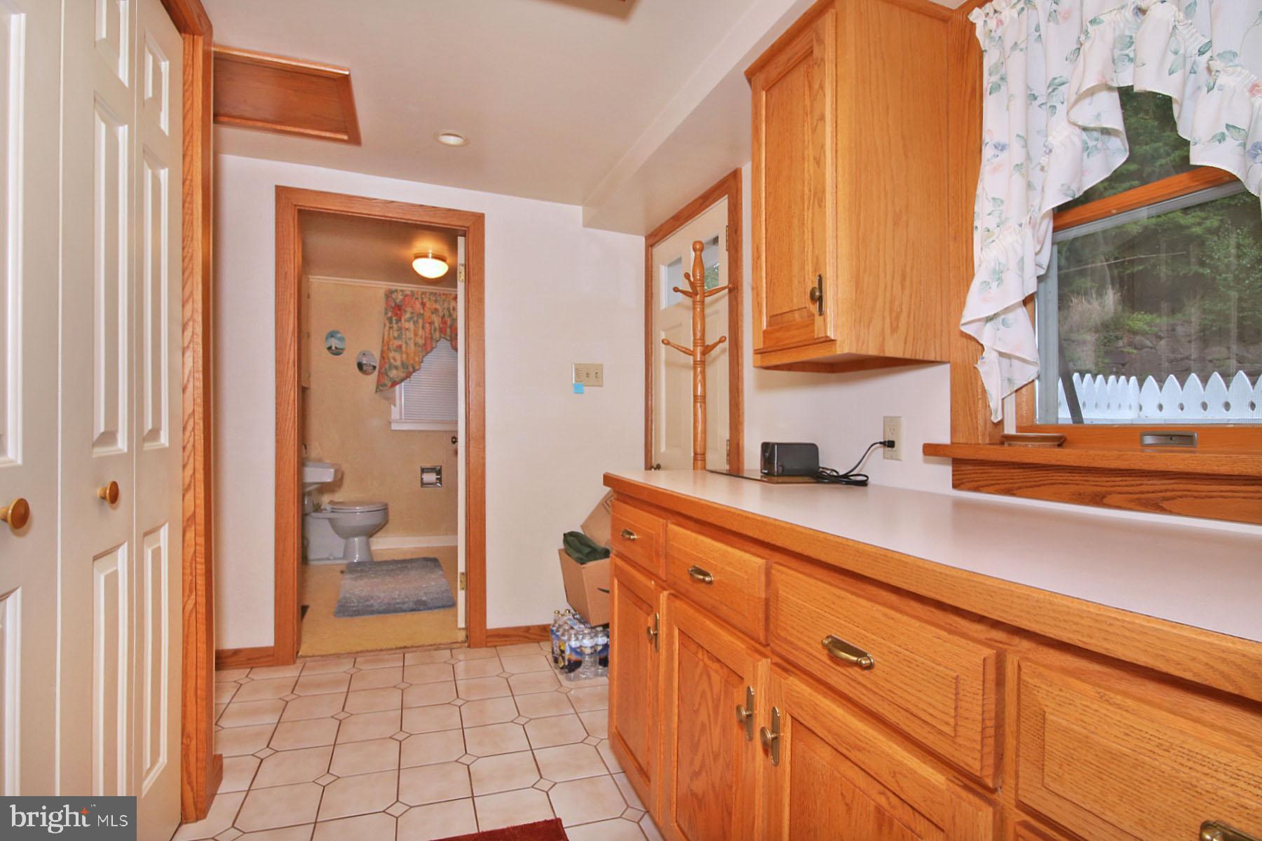 1061 Mine Road Lebanon, PA 17042 - Photo 37 of 88 1061-Butler's Pantry/Mud Room w/a view!
