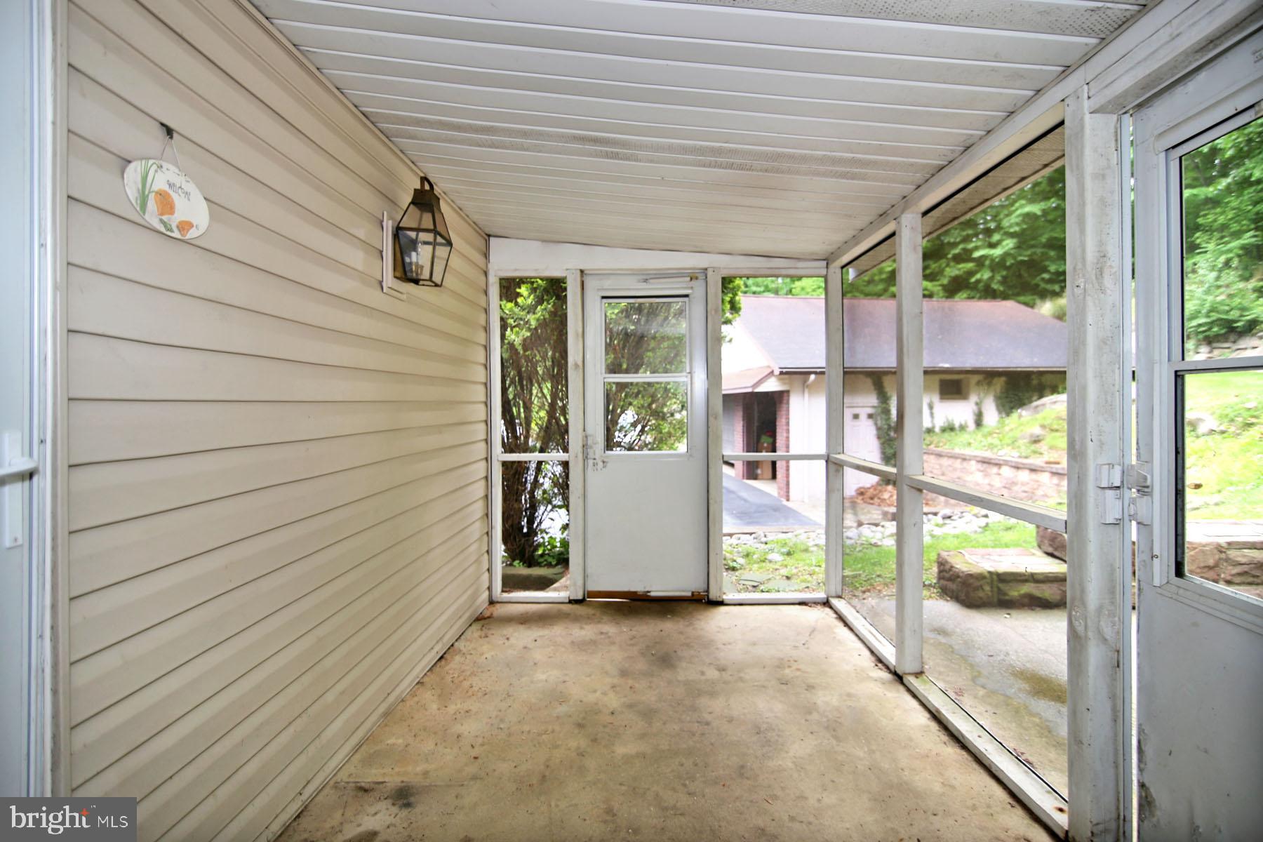 1061 Mine Road Lebanon, PA 17042 - Photo 85 of 88 1055-screened porch w/a view!