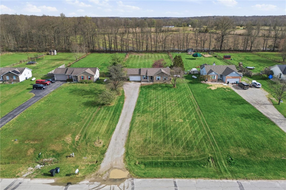 8747 Waynes Way Blanchester, OH 45107 - Photo 31 of 40 This aerial view showcases the property's expansive yard and well-maintained exterior.