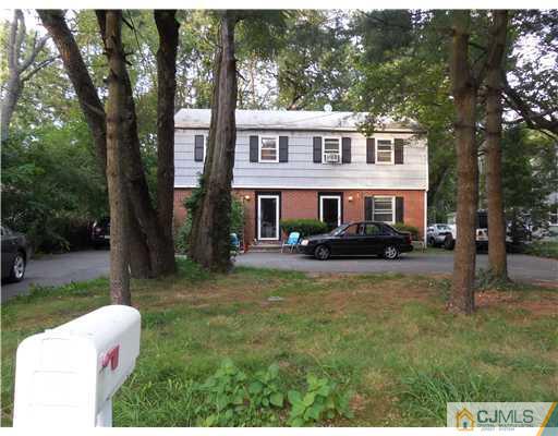107-09 Washington Road Princeton, NJ 08540 - Photo 1 of 1 a view of a house with swimming pool and sitting area