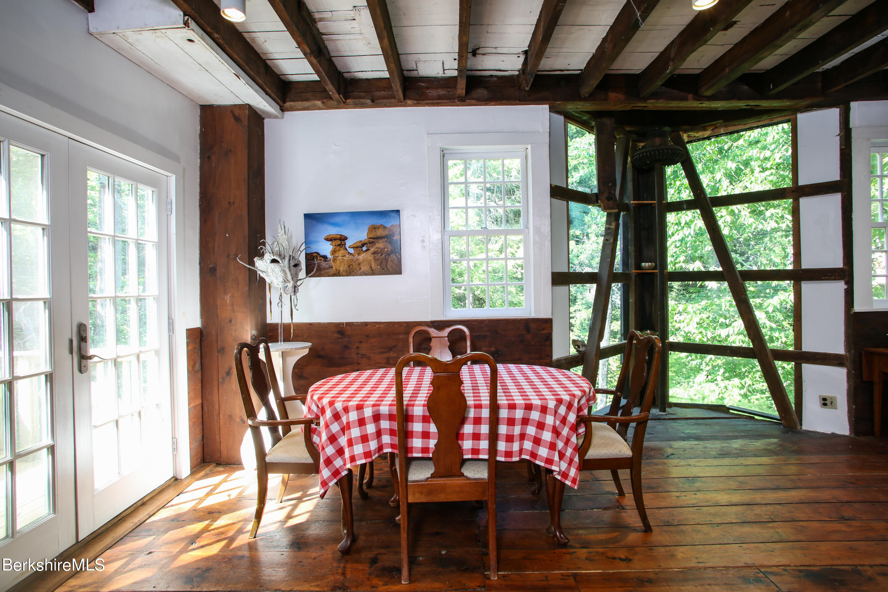 818 Main Road Chesterfield, MA 01084 - Photo 12 of 33 a view of a dining room with furniture window and wooden floor