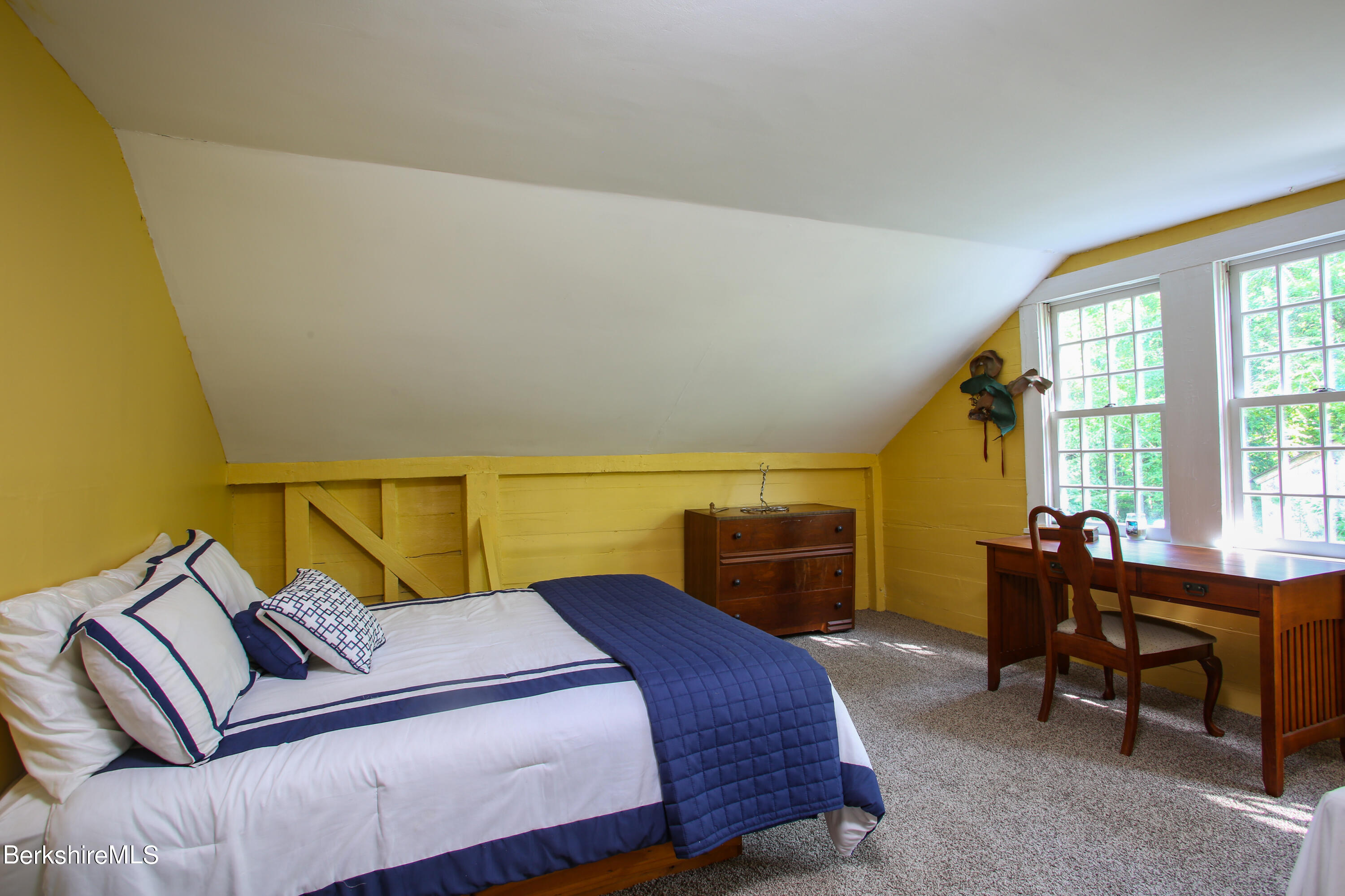 818 Main Road Chesterfield, MA 01084 - Photo 13 of 33 a bedroom with a bed and wooden floor