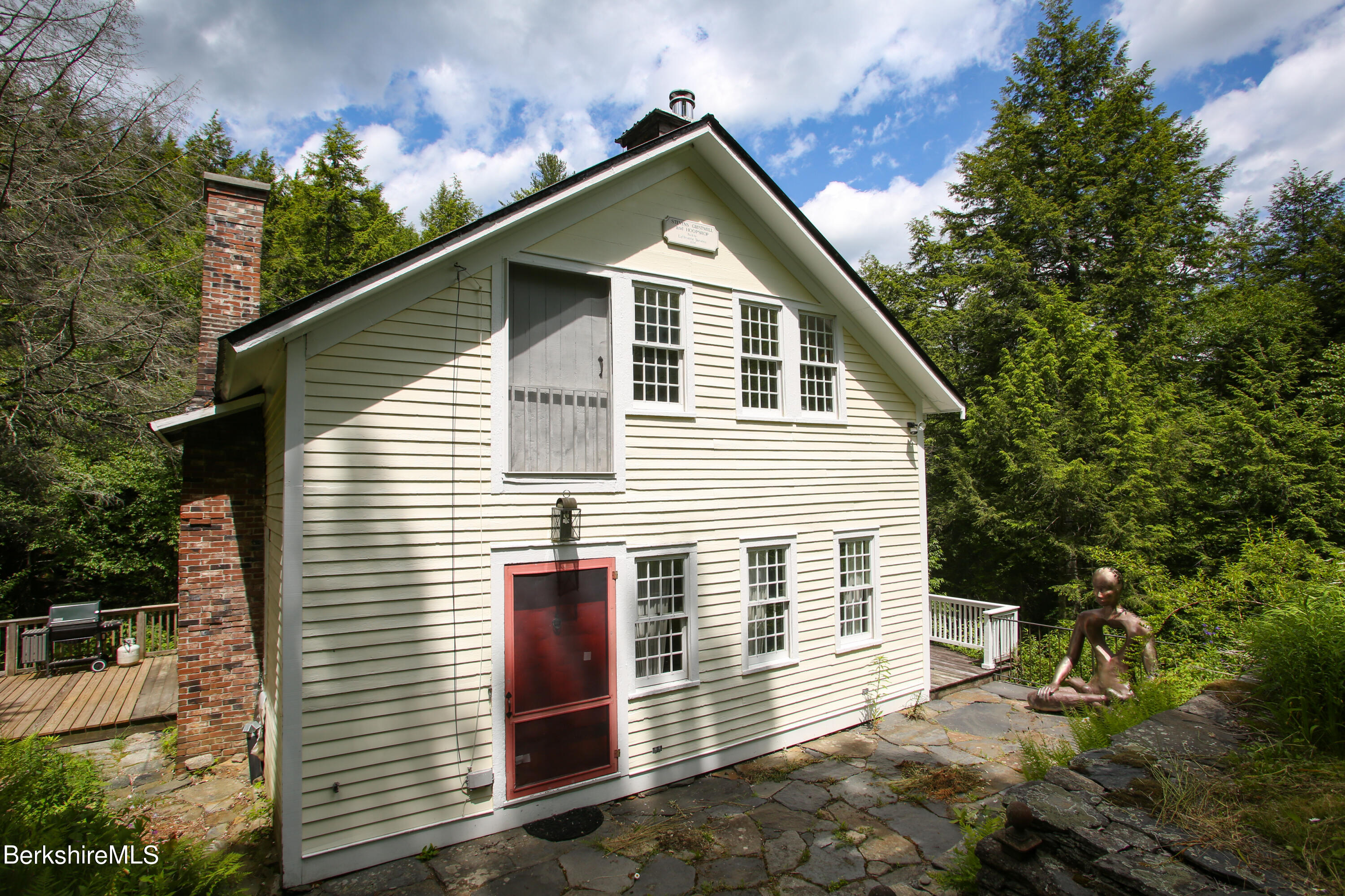 818 Main Road Chesterfield, MA 01084 - Photo 33 of 33 a front view of a house with a yard