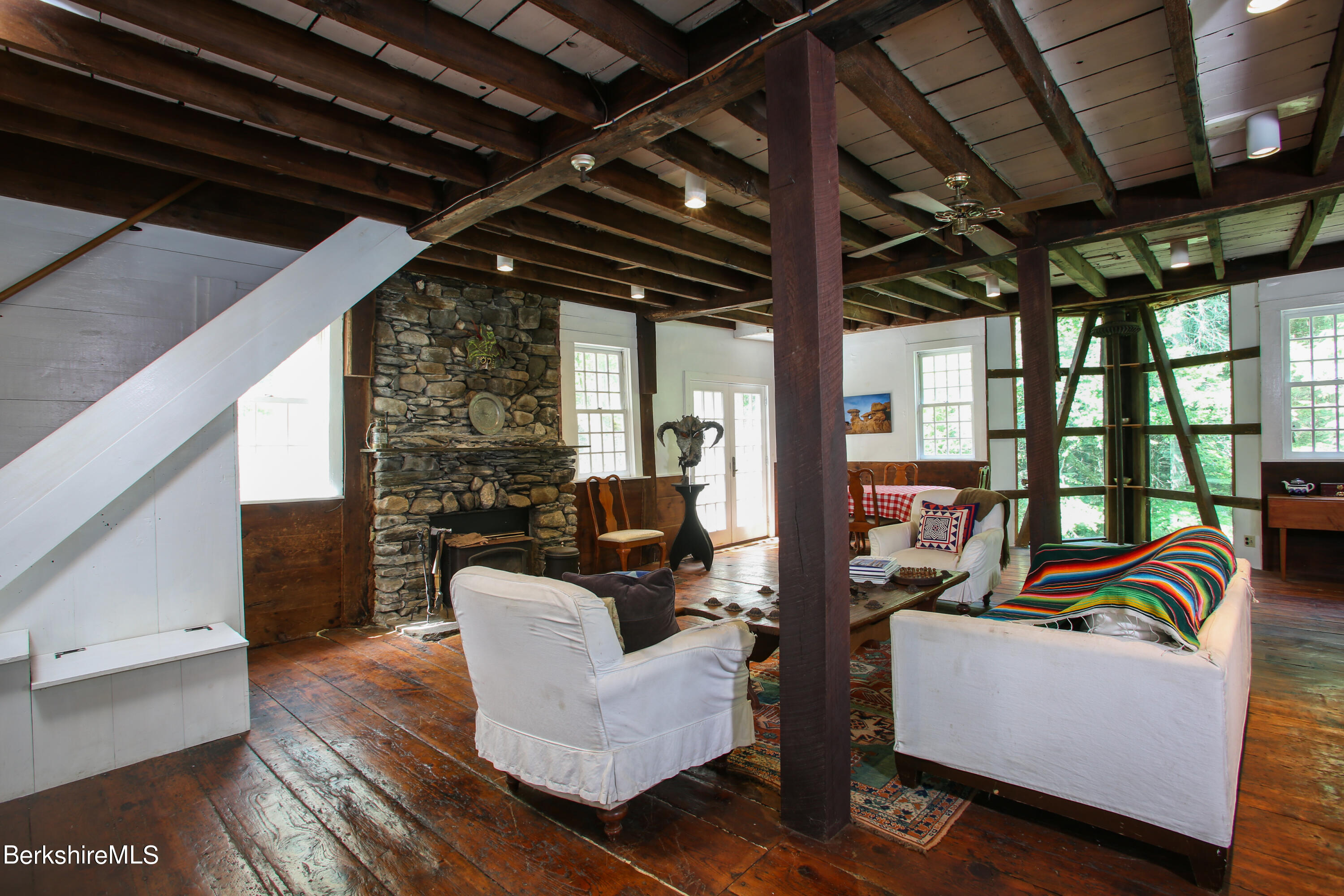818 Main Road Chesterfield, MA 01084 - Photo 6 of 33 a living room with furniture and a floor to ceiling window