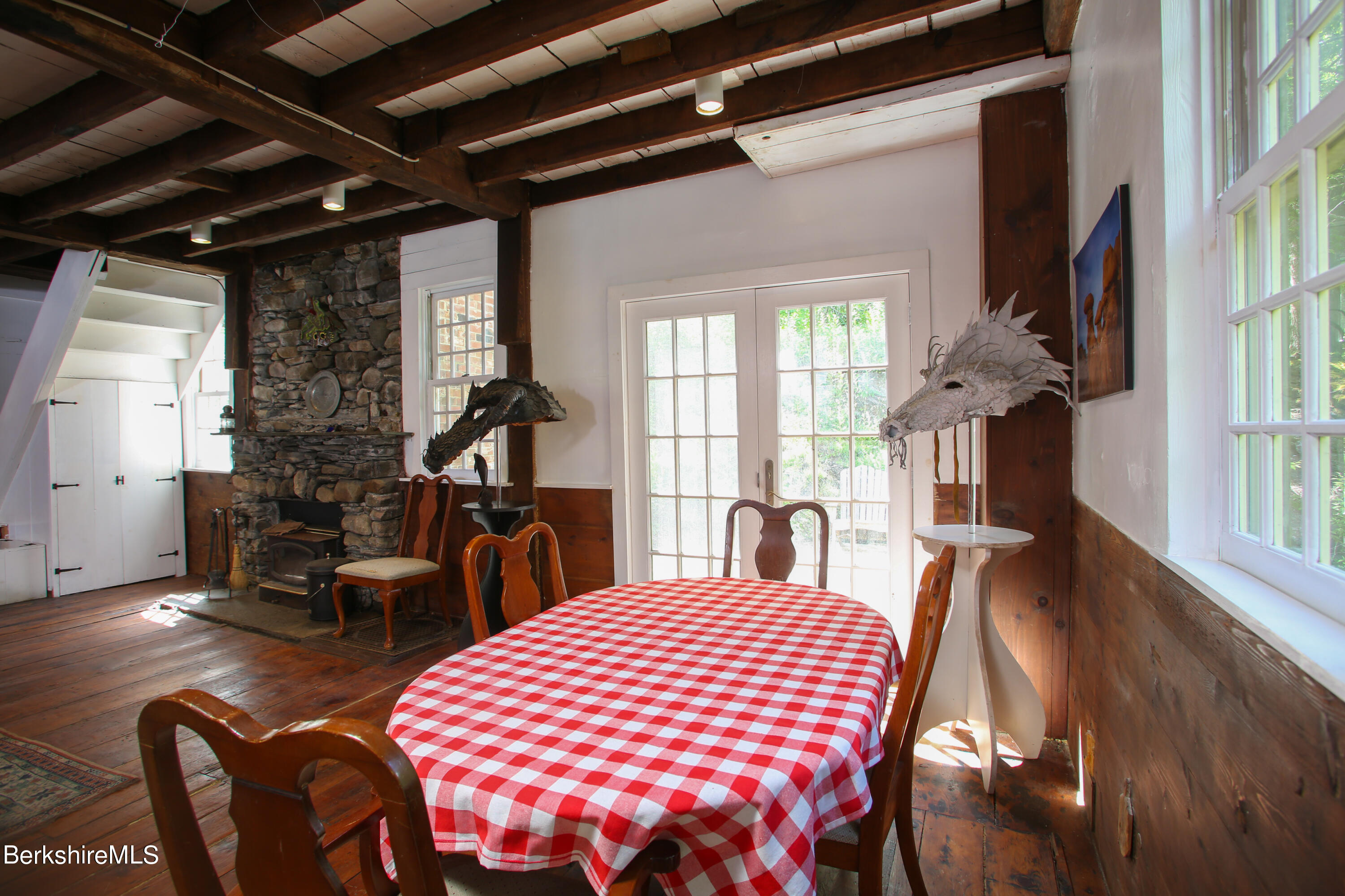 818 Main Road Chesterfield, MA 01084 - Photo 10 of 33 a view of a dining room with furniture window and wooden floor