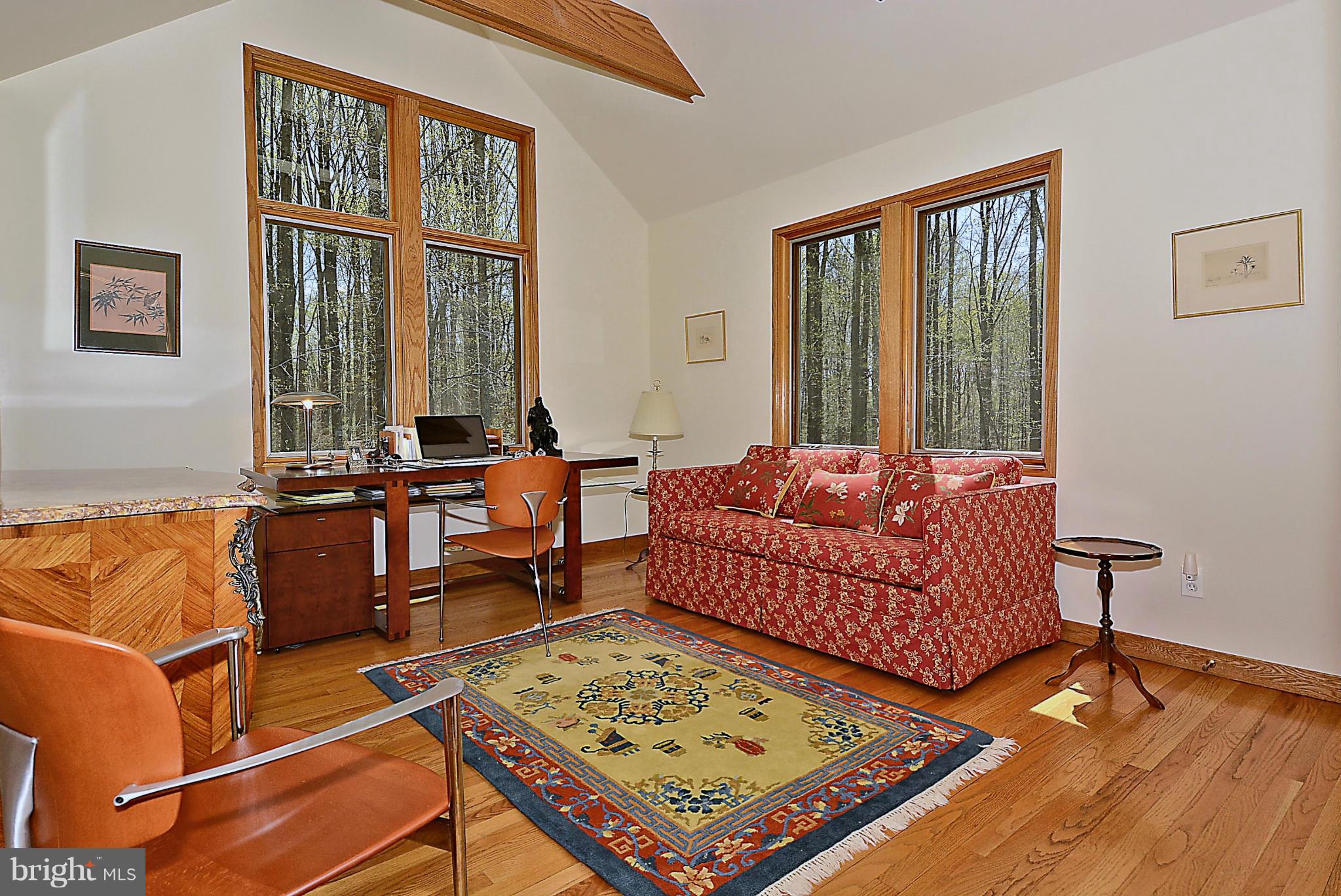 16308 Old Orchard Road Silver Spring, MD 20905 - Photo 22 of 30 a living room with furniture rug and window
