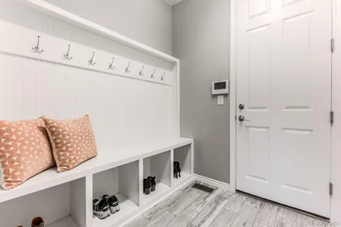 a view of kitchen with furniture and wooden floor