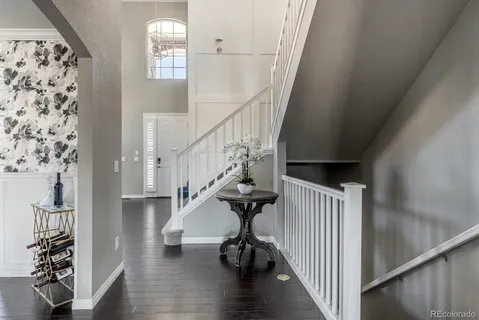 a view of entryway with wooden floor