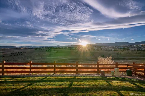 a view of a swimming pool with an ocean view