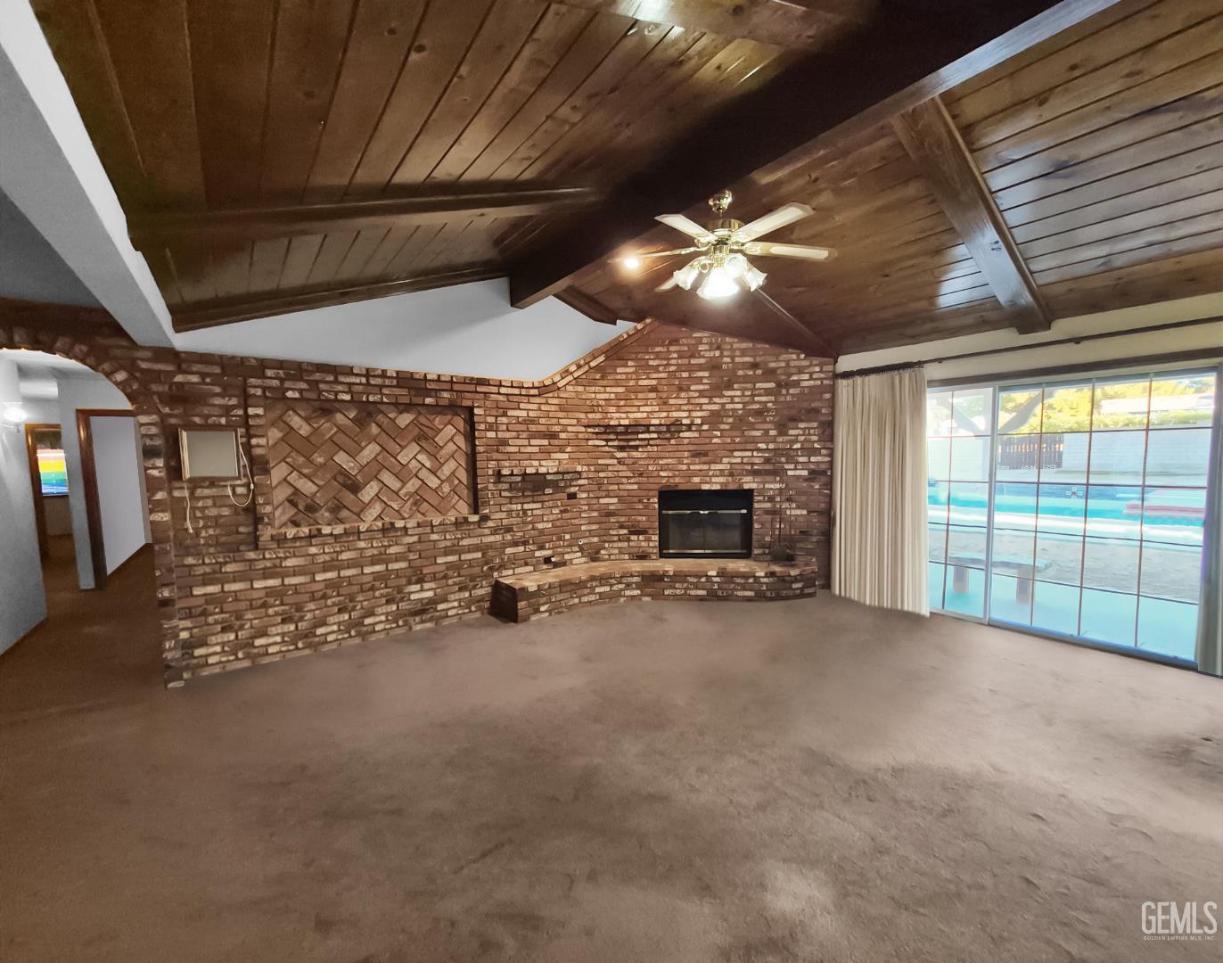 Undisclosed Address Lancaster, CA 93536 - Photo 5 of 22 a view of a livingroom with fireplace and a window
