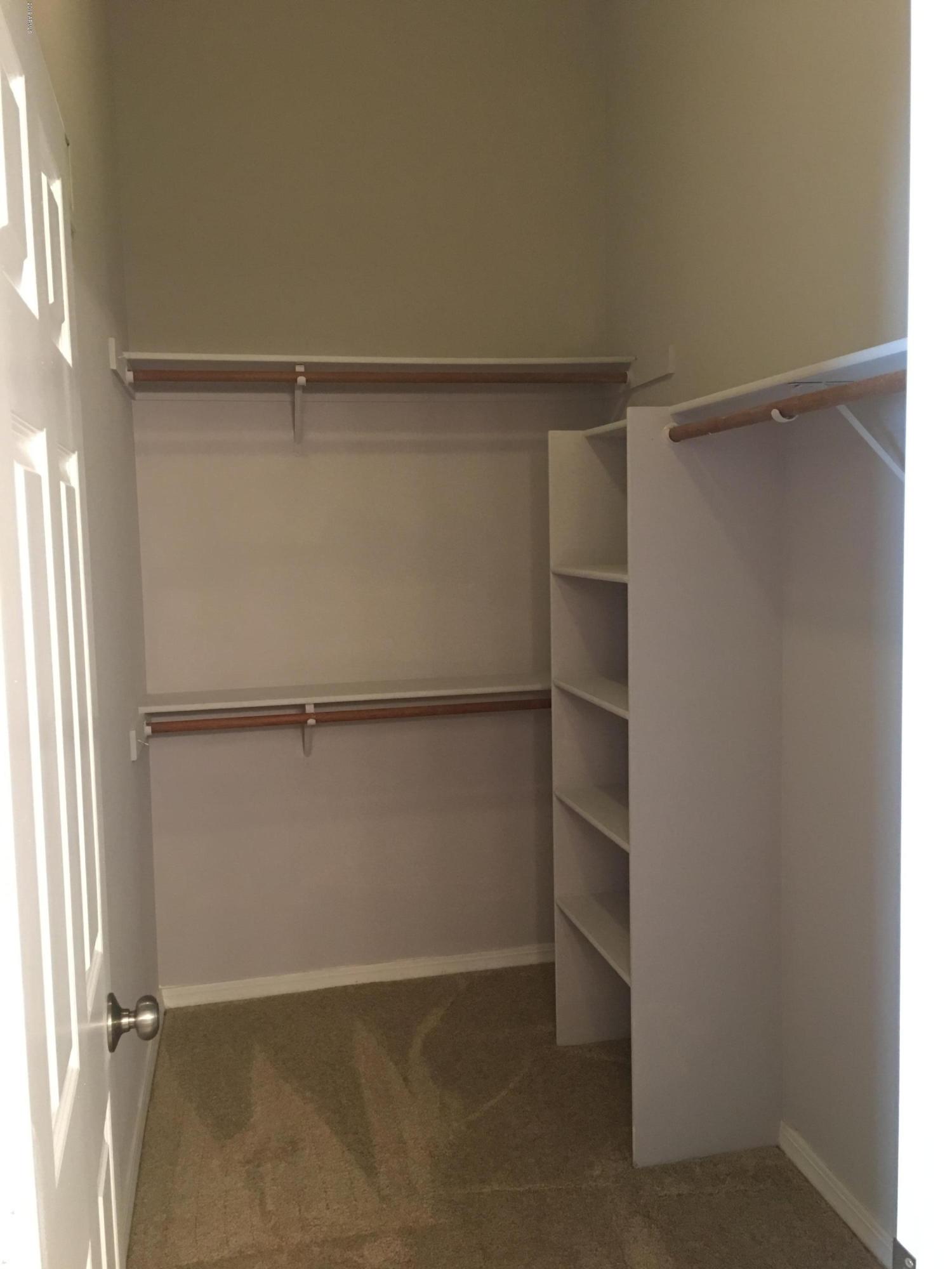 432 East Harwell Road Gilbert, AZ 85234 - Photo 16 of 17 a view of an empty walk in closet