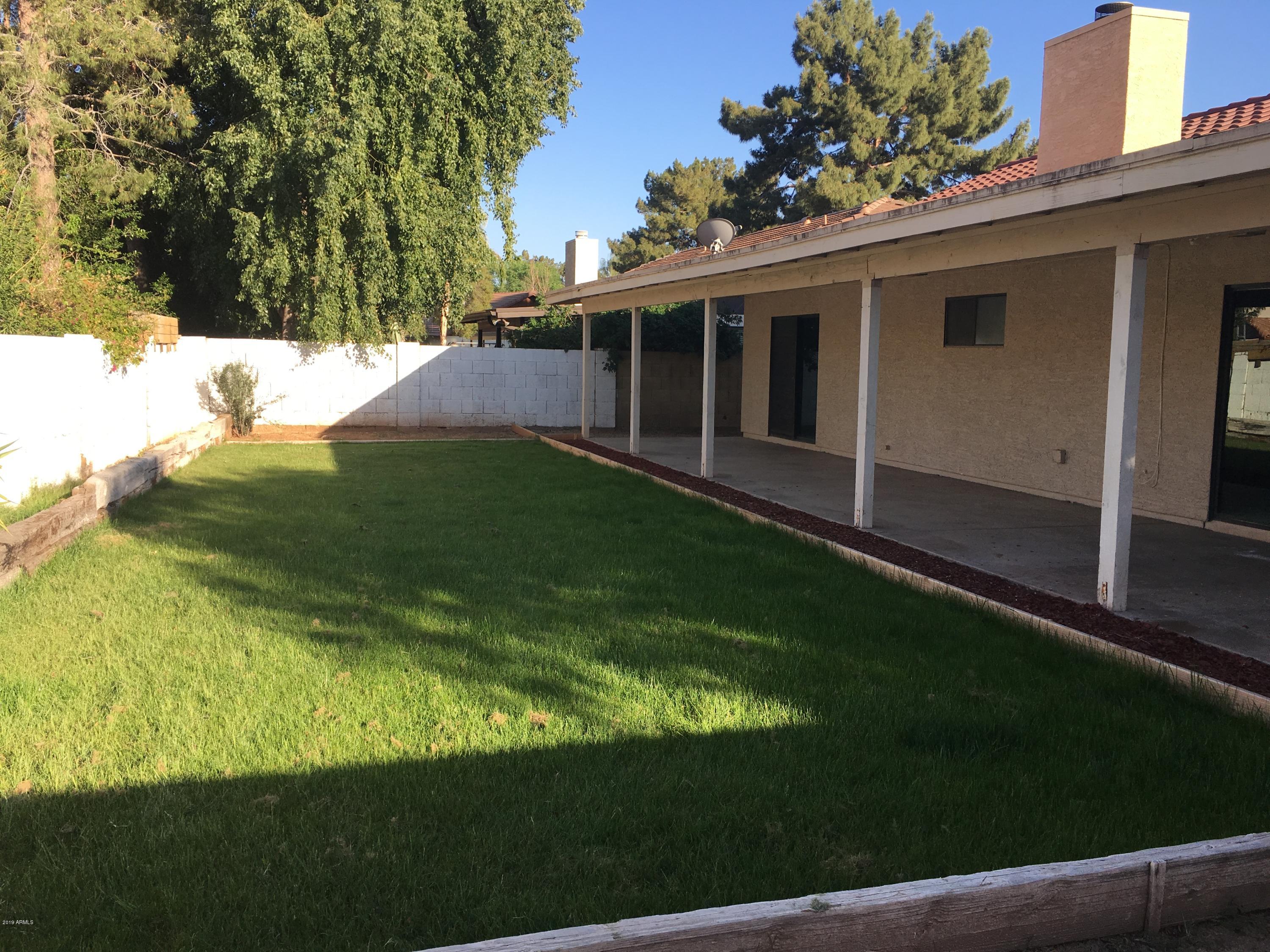 432 East Harwell Road Gilbert, AZ 85234 - Photo 17 of 17 a view of backyard with a garden and plants
