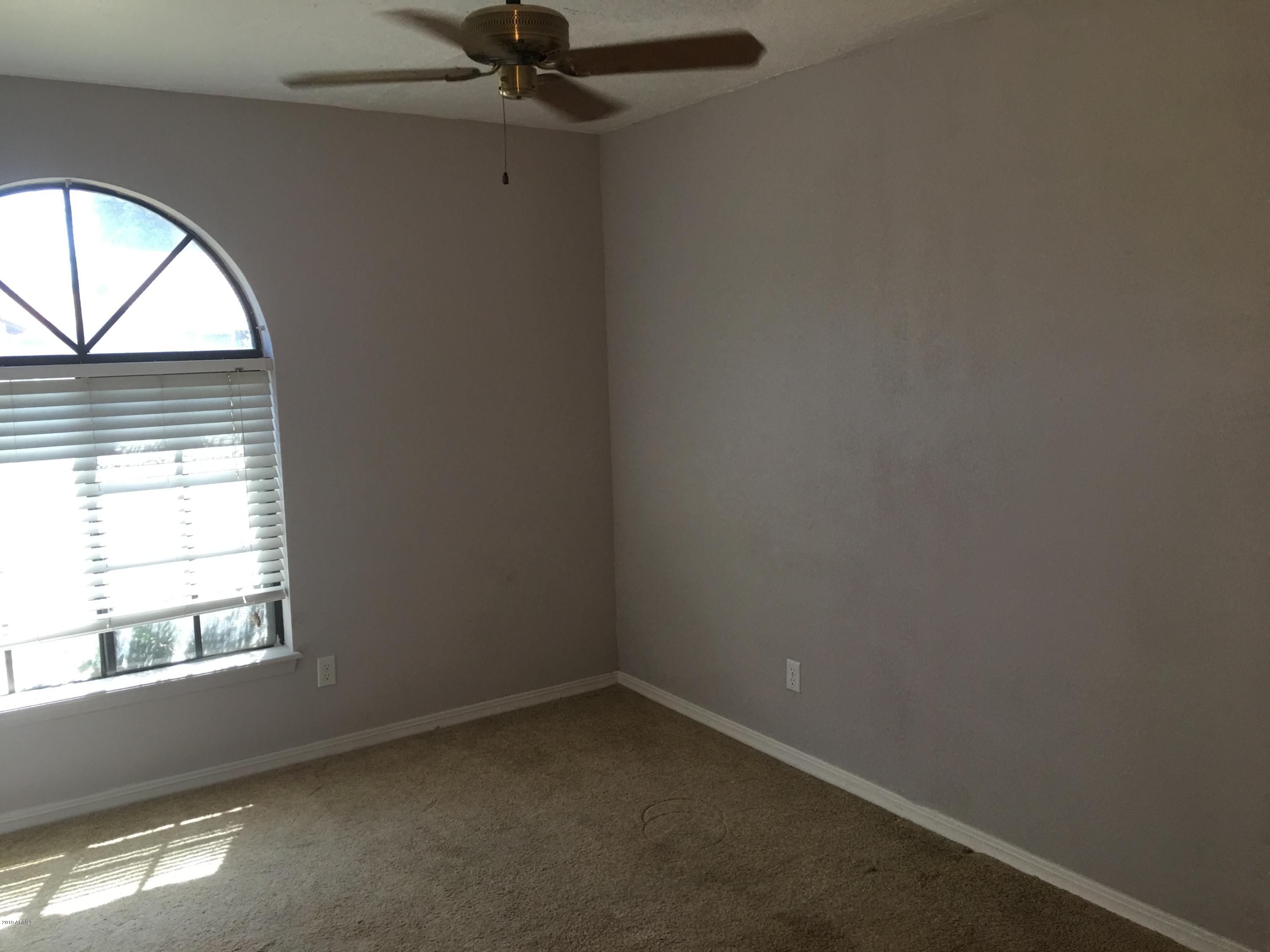 432 East Harwell Road Gilbert, AZ 85234 - Photo 8 of 17 an empty room with a window