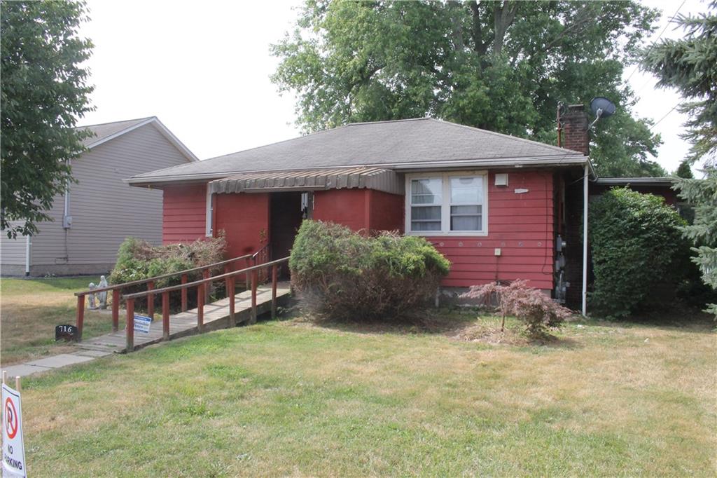 716 Kaye Avenue Monaca, PA 15061 - Photo 2 of 9 a front view of a house with a yard