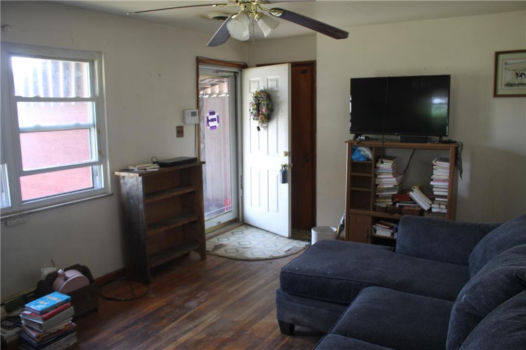 716 Kaye Avenue Monaca, PA 15061 - Photo 3 of 9 a living room with furniture and a flat screen tv