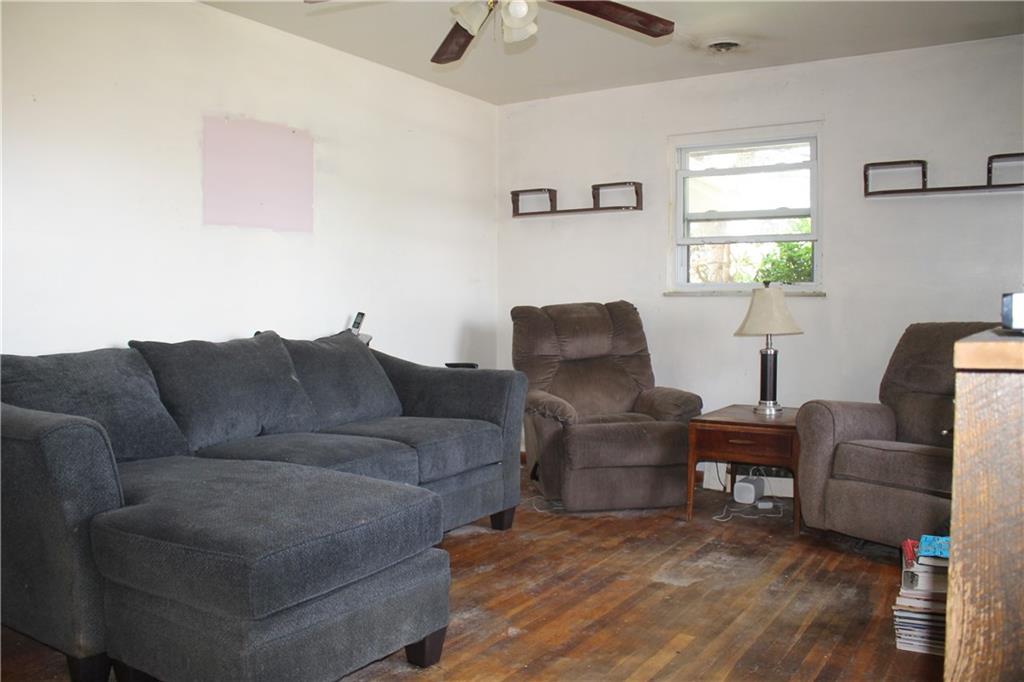 716 Kaye Avenue Monaca, PA 15061 - Photo 4 of 9 a living room with furniture and a window