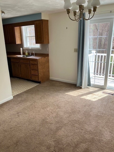 34 Lowell Road, Unit 36 Pepperell, MA 01463 - Photo 3 of 12 a view of an empty room with a window