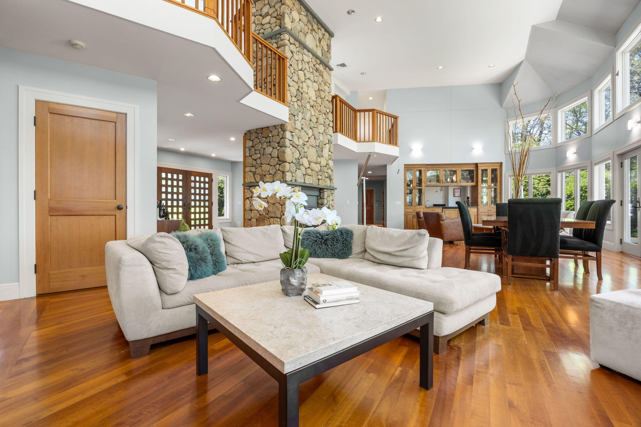 476 Baxter Neck Road Marstons Mills, MA 02648 - Photo 17 of 95 a living room with fireplace furniture and a wooden floor