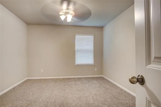 a view of empty room with window