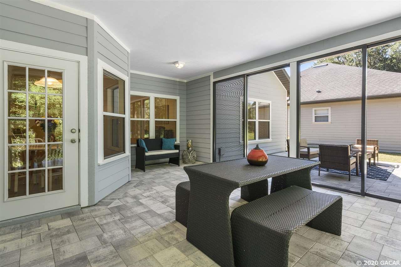 8321 Southwest 75th Road Gainesville, FL 32608 - Photo 25 of 29 New pavers and sliding screen door