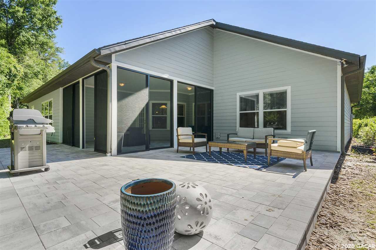 8321 Southwest 75th Road Gainesville, FL 32608 - Photo 27 of 29 Extended back patio paver area