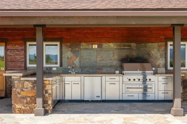 a view of kitchen sink and window