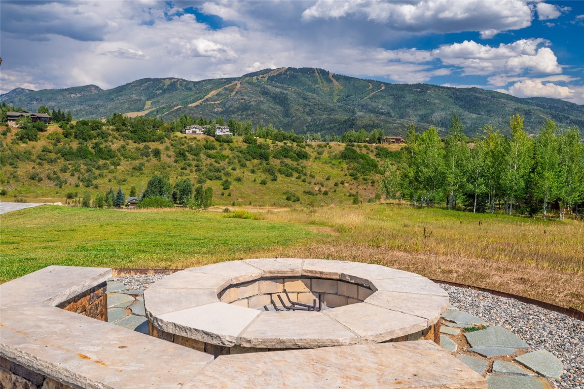 31105 Country Side Road Steamboat Springs, CO 80487 - Photo 18 of 50 a view of a swimming pool with a yard